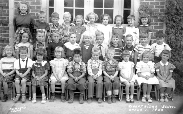 1950 - Wheat Ridge School, grade 1. Front row, left to right: Jody Burns, Diane Mayer, Judy Besel, Mara Moder, Unknown, Unknown, Unknown, Christine Larson(?), Linda Austin, Betsy Tinn. Middle row, left to right: Connie Sawdey, Unknown, Unknown, Unknown, U