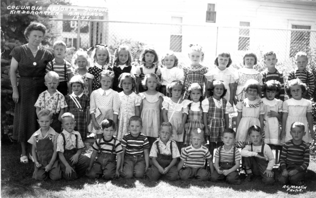 1949 - Columbia Heights School Kindergarten A.M. Class. Front row, left to right: Unknown, Campbell twin, Delbert Giddings, Unknown, Campbell twin, Unknown, Joe Neddo, Harold Eason, John Sheflin. Middle row, left to right: Larry Schreiber, Mara Moder, Dia